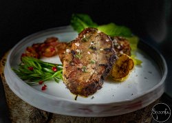 Thyme and garlic pork steak image